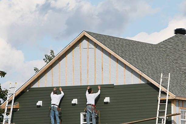 Professional Siding Installation technician working in Ridge, NY